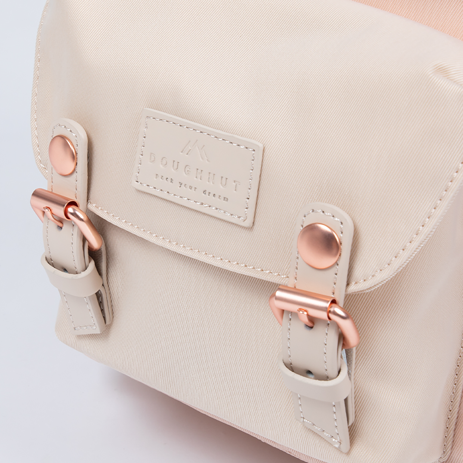 doughnut women's mini macaroon backpack Pastel Series Stone A Portal to a Pure White Soundscape Tucked away at a busy city corner Macaroon Mini Doughnut Backpack